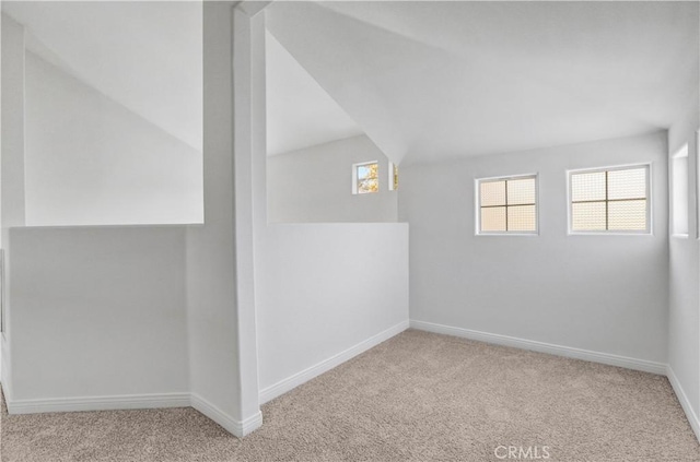 4064 Lemonberry Pl, Thousand Oaks, CA 91362 - additional living space featuring carpet floors, baseboards, and lofted ceiling