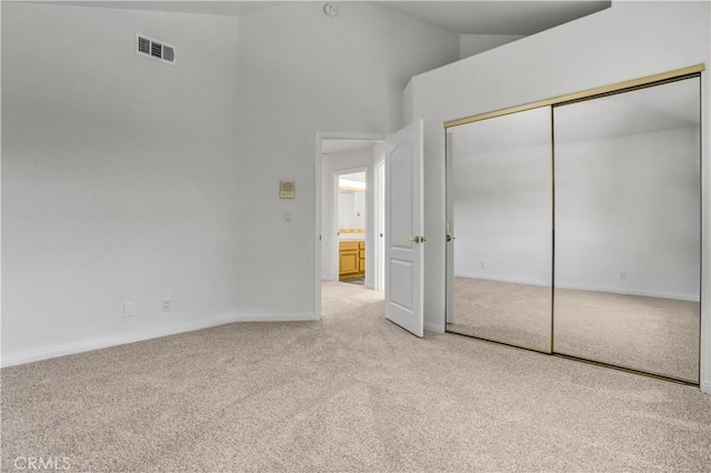 4064 Lemonberry Pl, Thousand Oaks, CA 91362 - unfurnished bedroom featuring light colored carpet, vaulted ceiling, a closet, and baseboards