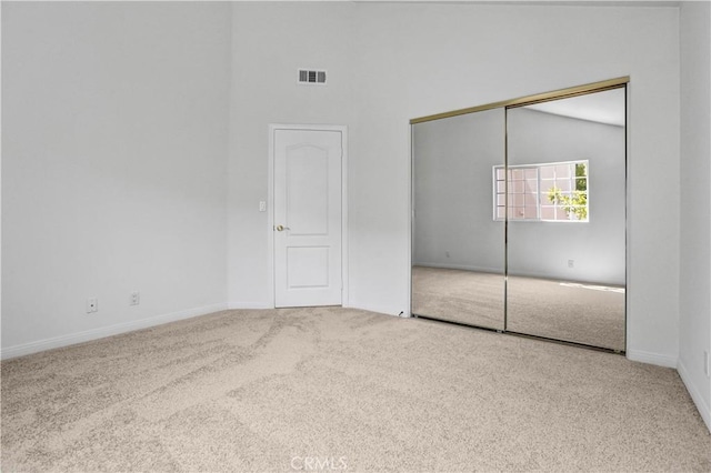 4064 Lemonberry Pl, Thousand Oaks, CA 91362 - unfurnished bedroom with carpet floors, a closet, baseboards, and high vaulted ceiling