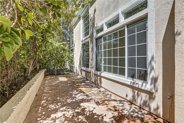 4064 Lemonberry Pl, Thousand Oaks, CA 91362 - view of side of home featuring stucco siding and a patio