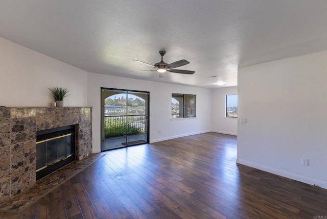1279 Cypress Dr, Vista, CA 92084 - unfurnished living room featuring a ceiling fan, a fireplace, and wood finished floors