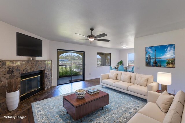 1279 Cypress Dr, Vista, CA 92084 - living area with hardwood / wood-style flooring, a ceiling fan, and a glass covered fireplace