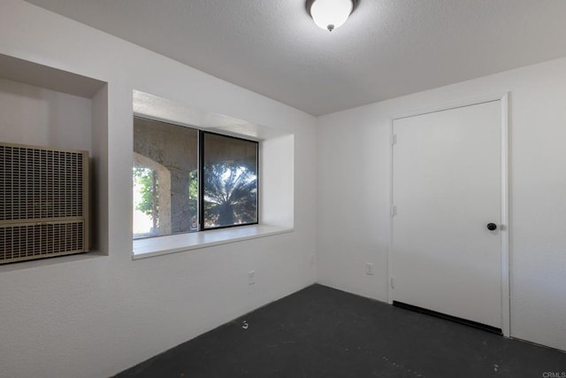 1279 Cypress Dr, Vista, CA 92084 - unfurnished bedroom with concrete flooring