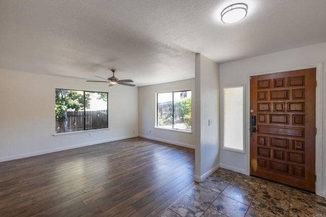 1279 Cypress Dr, Vista, CA 92084 - foyer entrance with a ceiling fan, a textured ceiling, and dark wood-style floors