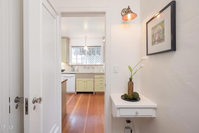 1770 Loma Vista St, Pasadena, CA 91104 - hallway with light wood-style floors and a sink