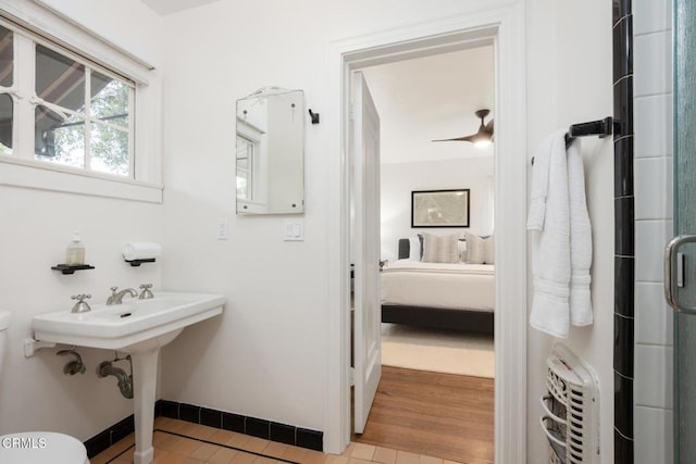 1770 Loma Vista St, Pasadena, CA 91104 - ensuite bathroom with toilet, a stall shower, and baseboards