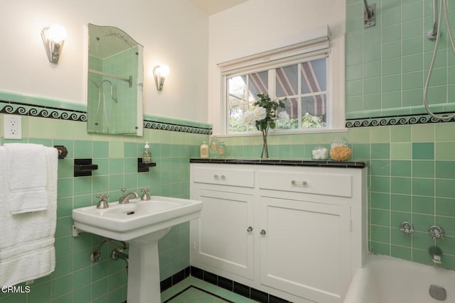 1770 Loma Vista St, Pasadena, CA 91104 - full bath featuring tile walls, washtub / shower combination, tile patterned flooring, and wainscoting