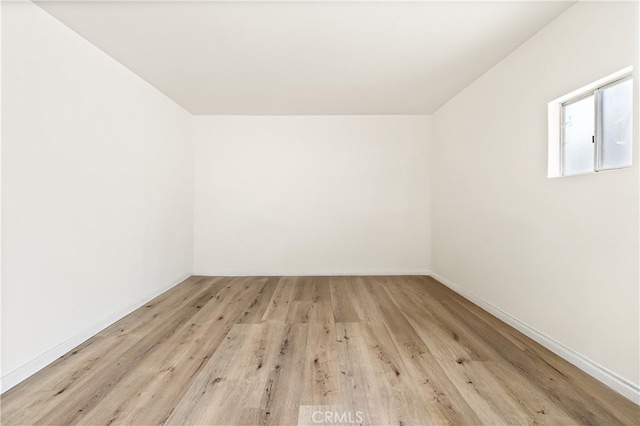 1251 Leighton Ave Unit 1251, Los Angeles, CA 90037 - unfurnished room with wood finished floors and baseboards