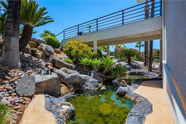 30525 Greenbrook Pl, Canyon Lake, CA 92587 - view of yard featuring a garden pond and a balcony