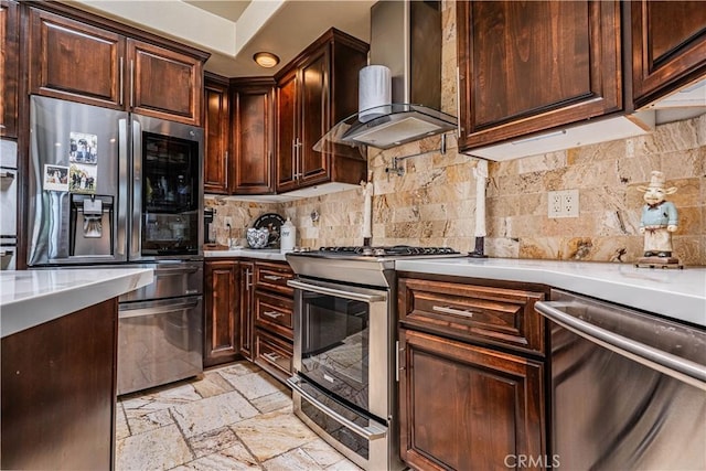 30525 Greenbrook Pl, Canyon Lake, CA 92587 - kitchen with stainless steel appliances, wall chimney exhaust hood, light countertops, and stone tile flooring