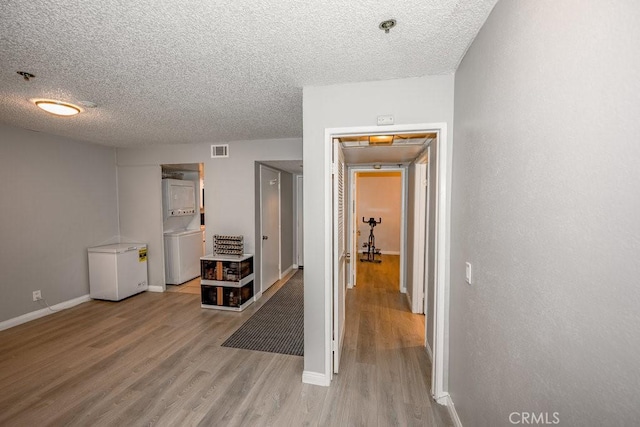 6545 Reseda Blvd Unit 3, Reseda, CA 91335 - corridor with wood finished floors and a textured ceiling