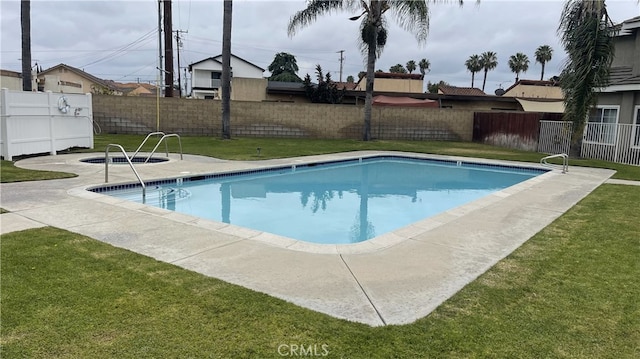 13442 Flower St Unit 15, Garden Grove, CA 92843 - view of swimming pool with a fenced backyard and a patio area