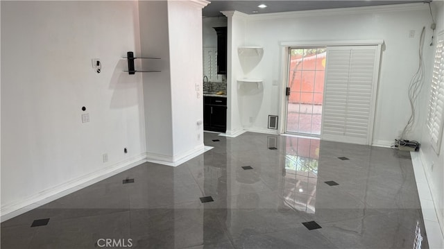 13442 Flower St Unit 15, Garden Grove, CA 92843 - empty room with crown molding and marble finish flooring