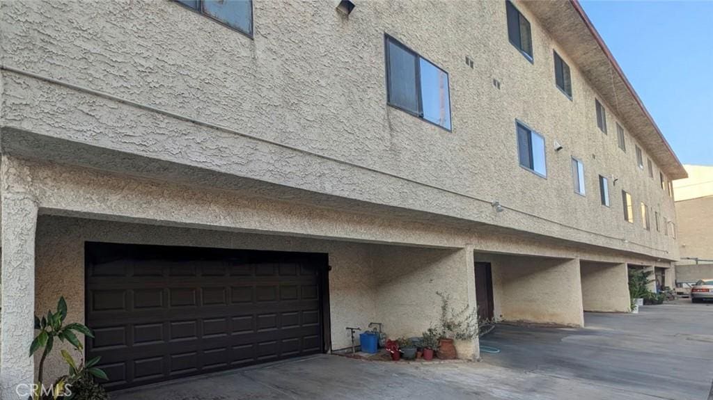 522 N Nicholson Ave Unit A, Monterey Park, CA 91755 - view of building exterior featuring a garage
