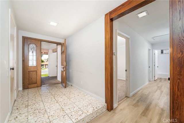 24752 Via, San Anselmo, Mission Viejo, CA 92692 - entryway featuring baseboards and light wood-type flooring
