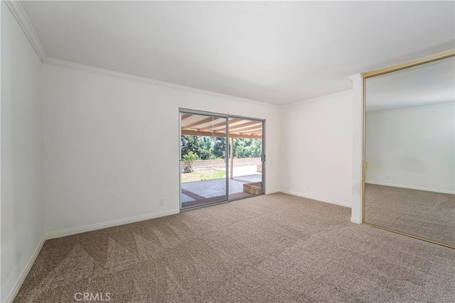 24752 Via, San Anselmo, Mission Viejo, CA 92692 - carpeted spare room featuring ornamental molding and baseboards