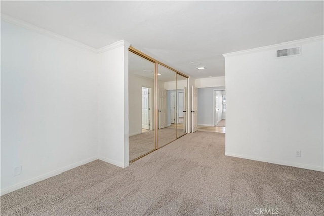 24752 Via, San Anselmo, Mission Viejo, CA 92692 - carpeted empty room featuring crown molding and baseboards