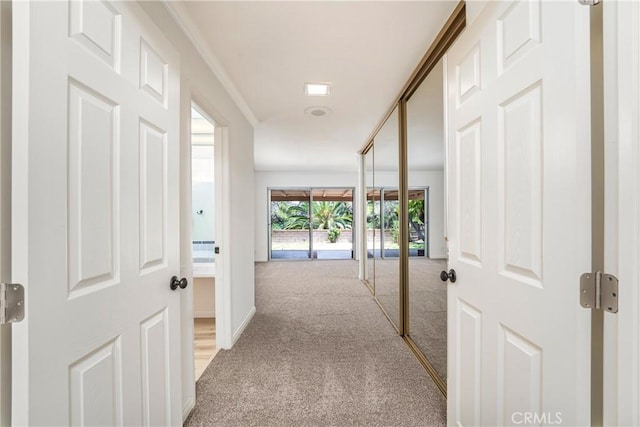 24752 Via, San Anselmo, Mission Viejo, CA 92692 - corridor with light colored carpet and baseboards