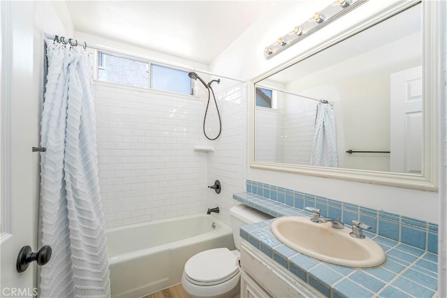 24752 Via, San Anselmo, Mission Viejo, CA 92692 - bathroom featuring shower / tub combo, vanity, and toilet