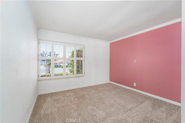 24752 Via, San Anselmo, Mission Viejo, CA 92692 - empty room featuring carpet floors, ornamental molding, and baseboards