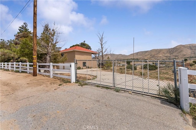 6367 Arrowhead Lake Rd, Hesperia, CA 92345 - gate with a mountain view