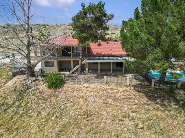 6367 Arrowhead Lake Rd, Hesperia, CA 92345 - back of house featuring stairway, a patio area, and a deck