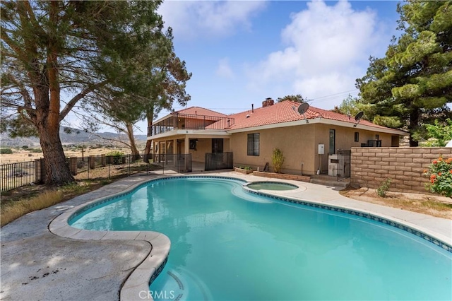 6367 Arrowhead Lake Rd, Hesperia, CA 92345 - view of swimming pool with an in-ground hot tub