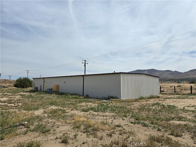 6367 Arrowhead Lake Rd, Hesperia, CA 92345 - view of pole building with a mountain view