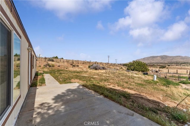 6367 Arrowhead Lake Rd, Hesperia, CA 92345 - view of yard with a patio, a mountain view, and a view of rural / pastoral area