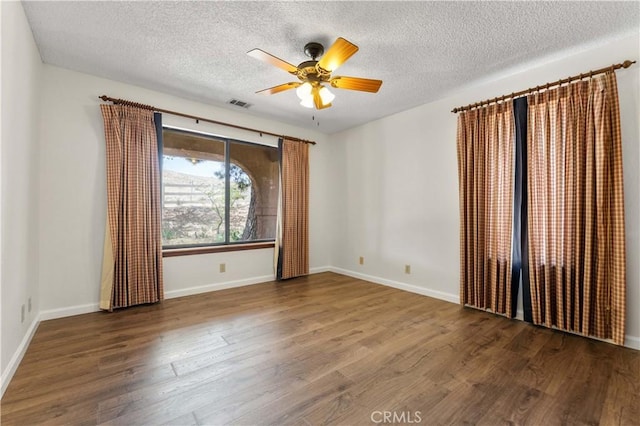 6367 Arrowhead Lake Rd, Hesperia, CA 92345 - spare room featuring wood finished floors, ceiling fan, and a textured ceiling