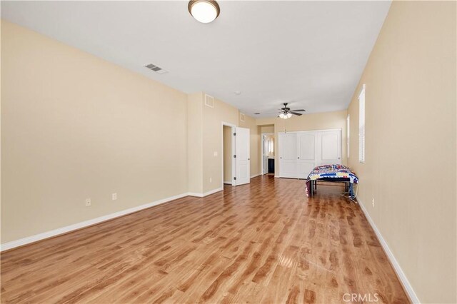 8 Via Del Fico Ct, Lake Elsinore, CA 92532 - playroom with light wood finished floors, baseboards, and ceiling fan