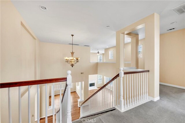 8 Via Del Fico Ct, Lake Elsinore, CA 92532 - staircase with a chandelier, baseboards, and recessed lighting