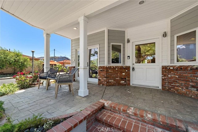 5894 E Appian Way, Long Beach, CA 90803 - view of patio featuring a porch