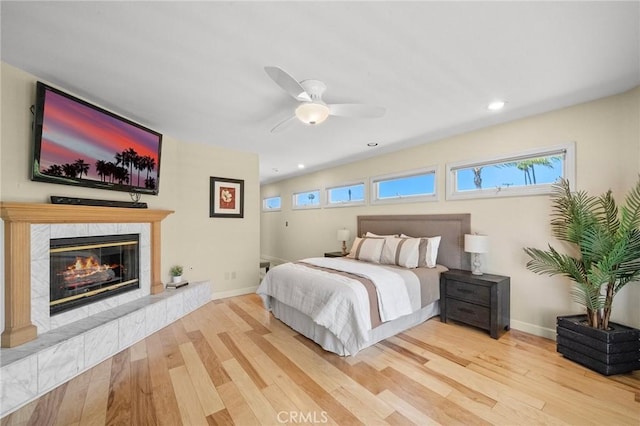 5894 E Appian Way, Long Beach, CA 90803 - bedroom with wood finished floors, a fireplace, baseboards, a ceiling fan, and recessed lighting