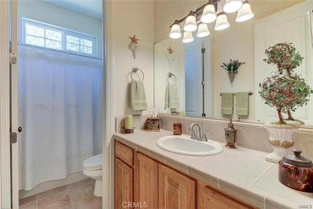 4451 Casa Sierra, Paradise, CA 95969 - bathroom featuring toilet, vanity, a shower with shower curtain, and tile patterned floors