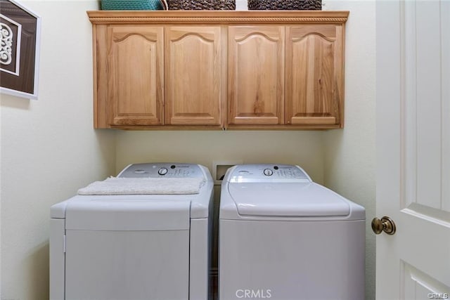 4451 Casa Sierra, Paradise, CA 95969 - washroom with washing machine and clothes dryer and cabinet space