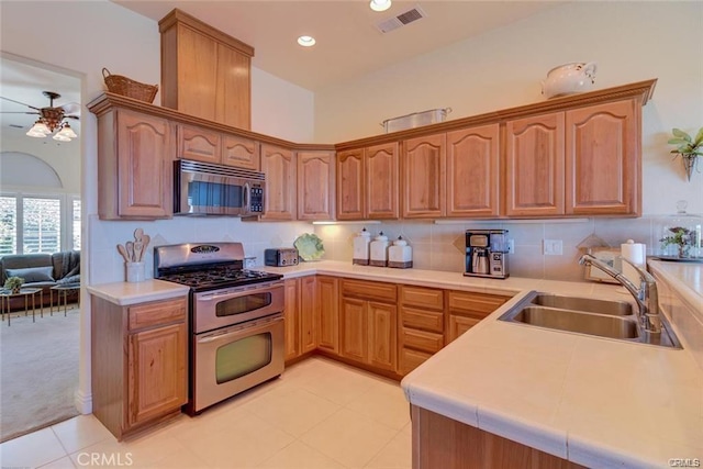 4451 Casa Sierra, Paradise, CA 95969 - kitchen featuring appliances with stainless steel finishes, a sink, ceiling fan, light countertops, and recessed lighting