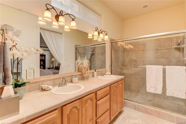 4451 Casa Sierra, Paradise, CA 95969 - ensuite bathroom with a stall shower, double vanity, and tile patterned flooring
