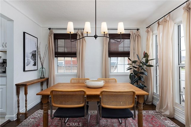 6062 Gaviota Ave, Long Beach, CA 90805 - dining space with healthy amount of natural light and dark wood-style floors
