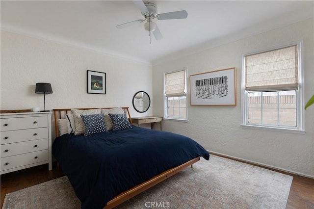 6062 Gaviota Ave, Long Beach, CA 90805 - bedroom featuring wood finished floors, a textured wall, baseboards, crown molding, and a ceiling fan