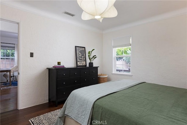 6062 Gaviota Ave, Long Beach, CA 90805 - bedroom featuring wood finished floors, crown molding, and a textured wall