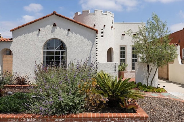 6062 Gaviota Ave, Long Beach, CA 90805 - mediterranean / spanish-style house with stucco siding and a tile roof