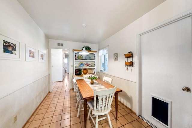 dining room with light tile patterned floors