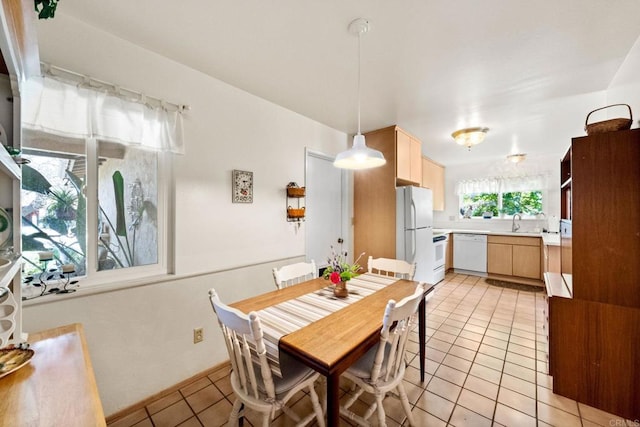 dining room with light tile patterned floors