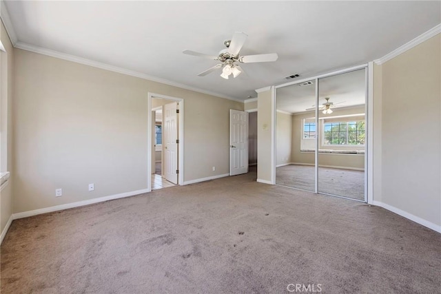 16350 Ridge View Dr, Apple Valley, CA 92307 - unfurnished bedroom featuring ornamental molding, carpet floors, baseboards, ceiling fan, and connected bathroom
