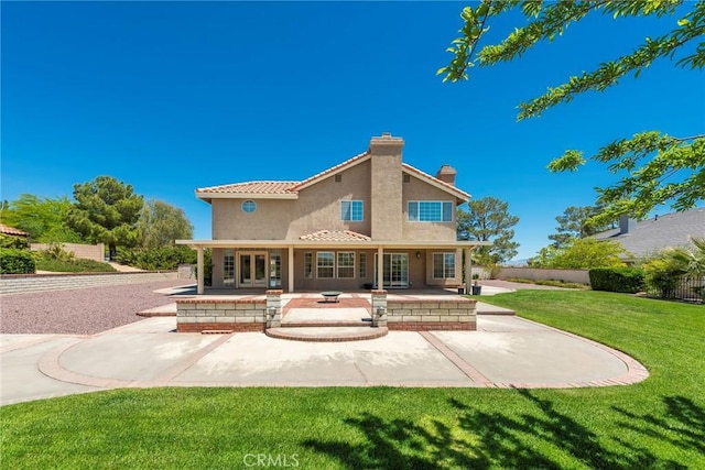 16350 Ridge View Dr, Apple Valley, CA 92307 - back of house featuring stucco siding, a chimney, and a patio