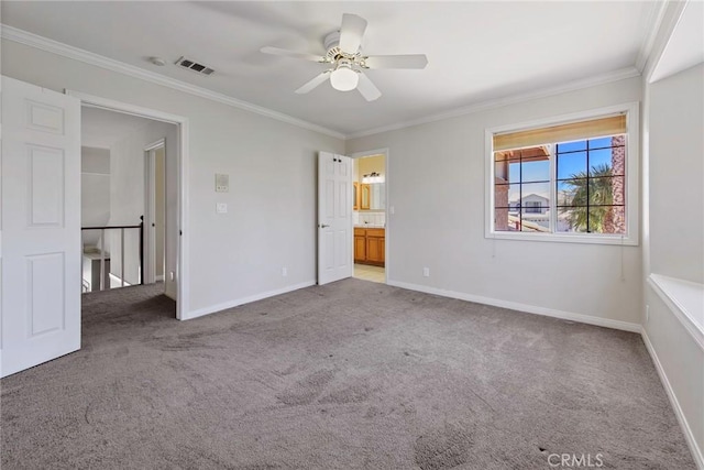 16350 Ridge View Dr, Apple Valley, CA 92307 - unfurnished bedroom with carpet flooring, ornamental molding, baseboards, ceiling fan, and connected bathroom