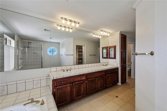 16350 Ridge View Dr, Apple Valley, CA 92307 - full bathroom with tile patterned flooring, ornamental molding, a tile shower, double vanity, and toilet