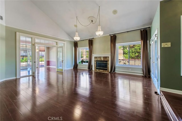 16350 Ridge View Dr, Apple Valley, CA 92307 - unfurnished living room with baseboards, wood finished floors, a fireplace, french doors, and high vaulted ceiling