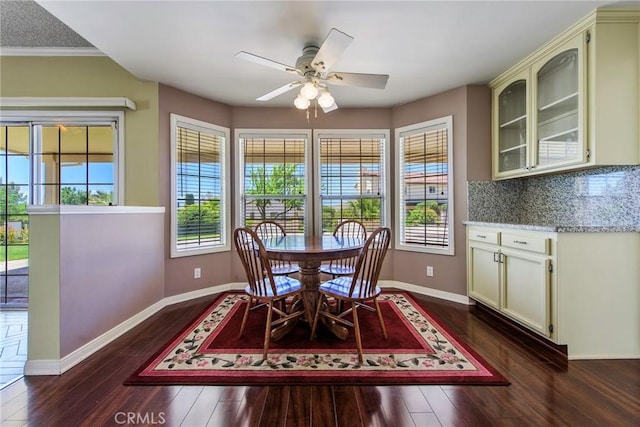 16350 Ridge View Dr, Apple Valley, CA 92307 - dining area featuring dark wood-style flooring, a ceiling fan, and baseboards